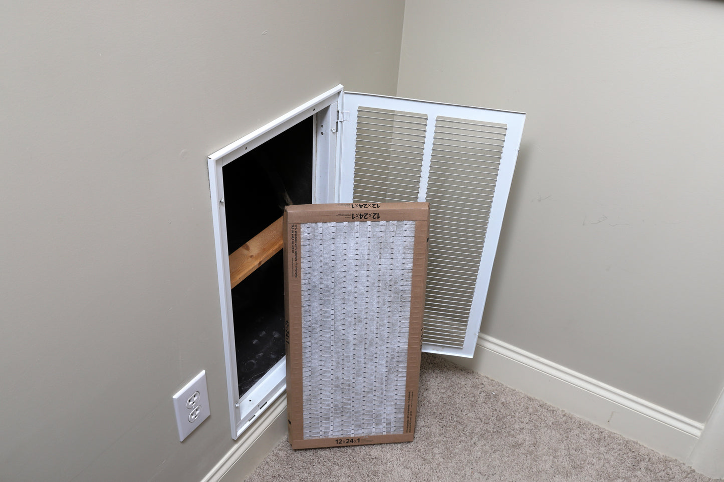 Replacing the air filter on a home central air conditioning system